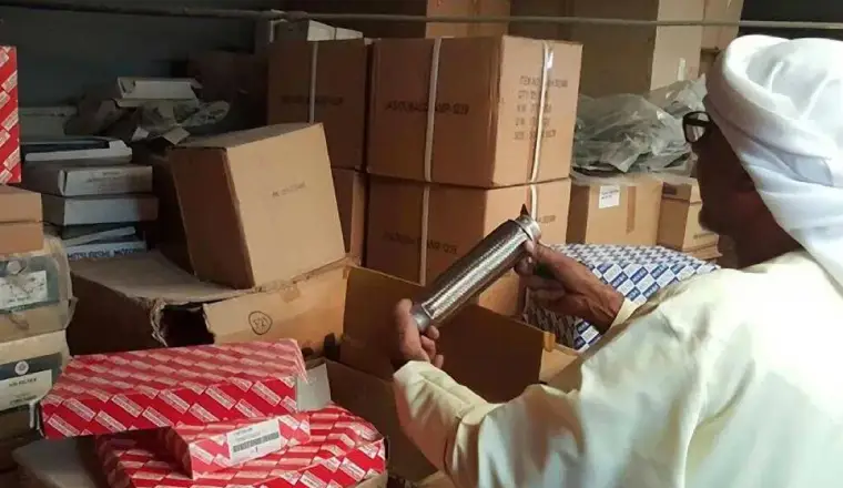 image of UAE officials seizing boxes of goods that are copies of brands in Dubai