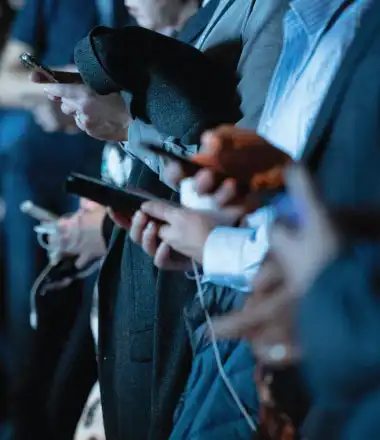 group of people using social media on their smartphones