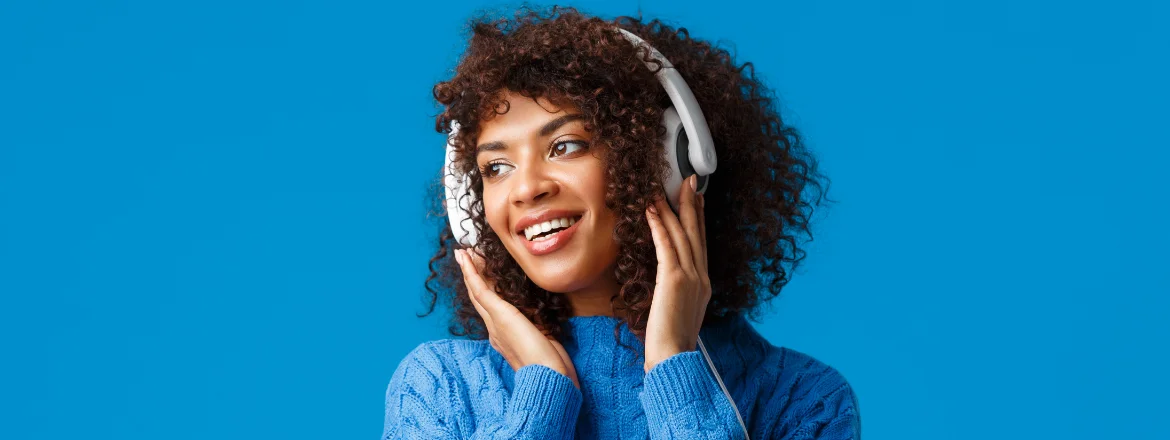 image of a woman listening to epidemic sound on her headphones
